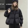 Женский пуховик укороченный черный, объемный, с рукавами на молнии
